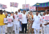 TDP leaders carry liquor bottles, protest against liquor deaths in Andhra Pradesh