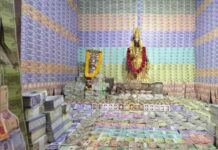 Andhra temple decorated with currency notes, gold